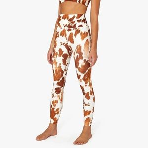 Cow hide WEWOREWHAT sold out leggings NWT size XS